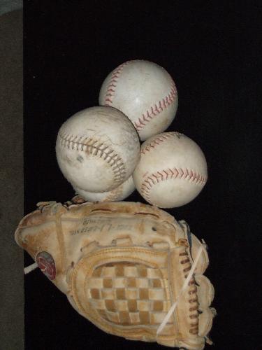Big balls, little balls, everybody loves softballs - The trusty Rawlings softball glove I bought with my babysitting money when I was 15. 32 years later, and it still gets the job done!