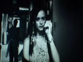 Alexis Bledel - In Sin City, Becky, Alexis Bledel, approaches the elevator while talking with her mother on the phone.