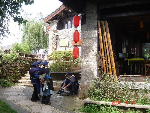 lijiang - traditional old women in lijiang