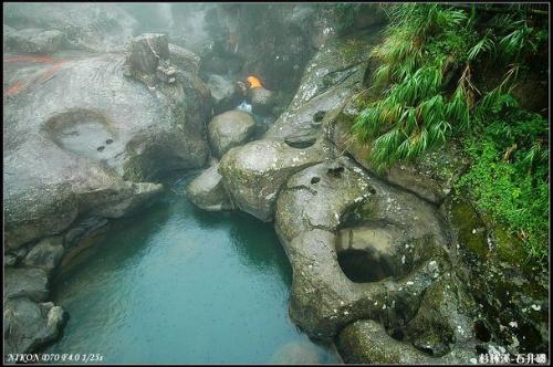 sleeping man - it looks like he falls asleep by creek in the creature of nature 