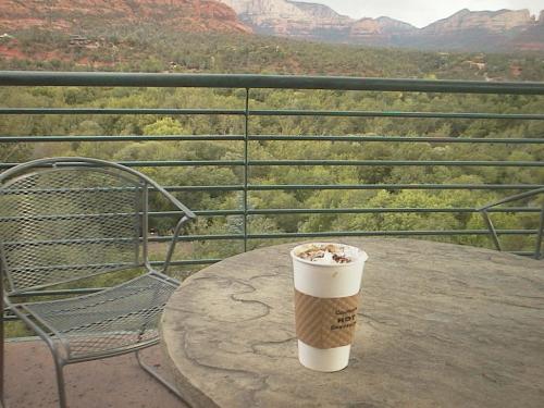 Coffee With A View - A nice hot cup of coffee on the table at Ravenheart Cafe in Sedona Arizona.
