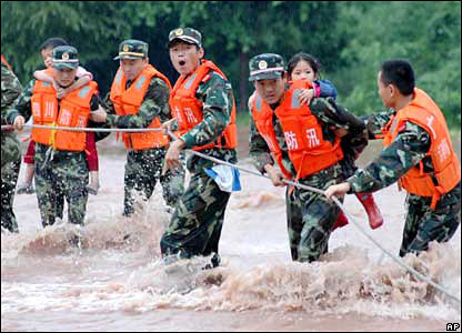 China Flood - Rescuers at work.