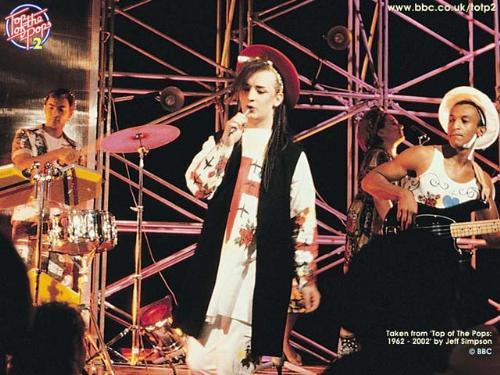 Culture Club - Culture Club is an English pop group, that achieved considerable global success in the 1980s. The band were fronted by gender-bending vocalist Boy George, the other band members being Mikey Craig on bass, Roy Hay on guitar and keyboard, and Jon Moss (formerly of The Damned, The Clash, London and Adam and the Ants) on drums.