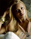 Ciara - Ciara looking all dolled up. Just like a barbie doll. Blond hair and pink lipstick.