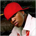 Neyo - Neyo looking sexy with a red hat to da back.