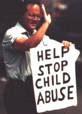 Help stop child abuse protester. Help stop child a - Help stop child abuse protester. Help stop child abuse protester. Help stop child abuse.