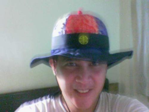 Me - Combination of western & chinese hats.