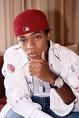 Bow wow - Bow Wow chillin on the couch in a white button-up shirt and red hot