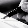 poetry - writing in notebook