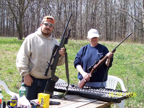 Easter Day Rifle Target Practice - I guess you can call us rednecks! This is a picture of my husband and mother in law on easter sunday! We got the rifles and headed out to the back forty for some rifle shooting! We had a good time!