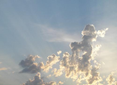 clouds - clouds with the sunlight streaming through.