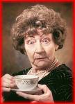 This lady is having a nice tea - cup of tea