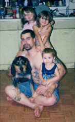 Tina12679 family - This is my hubby and 3 kids and our coonhound. This is what I live for they are my life all of them.....even the dog LOL