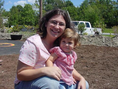 Diane and Lilly - Here we are at the garden center fair. Lilly was around 1 1/2 yrs. old. Look at her beautiful copper hair!