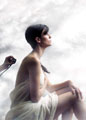 Chronic Pain - woman sitting in pain