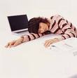 Nap - This is a lady laid out on her desk!