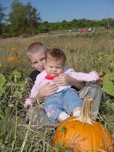 Lilly and Christian - This was a picture I took of them in the pumpkin patch at Applewood Orchards in Warwick. How cute!