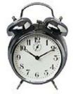 alarm clock - An alarm clock is a clock that can be set to sound a bell or buzzer at a desired hour. The primary use of these clocks is to awaken people from their sleep in order to start their days in the mornings, but they are sometimes used for other reminders as well. To stop the sound, a button or handle on the clock needs to be pressed, and some stop automatically after a few minutes if left unattended. A classical analog alarm clock has an extra "hand" that is used to specify the time at which to activate the alarm.