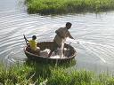 fishing through net - Potographed at Mysore lake