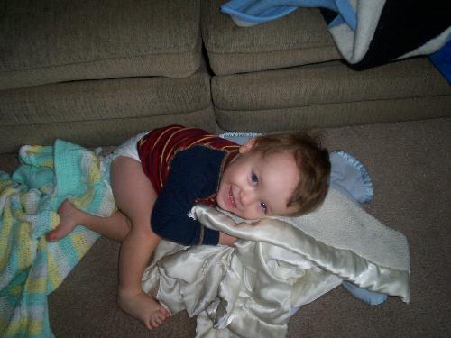 my son - my son snuggling his favorite blankets
