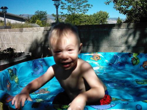My big man - My son Collin playing in his new pool.