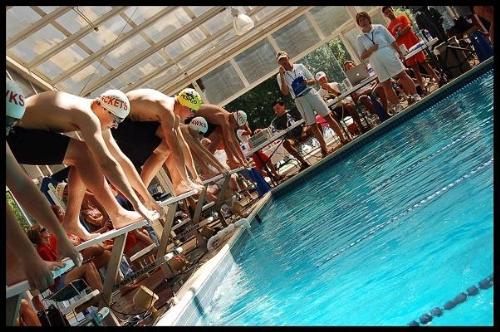 Swimming - Plano East vs. Rockwall & Rockwall-Heath Swim meet Sept. 2006  Varsity Race Boys All on starting blocks