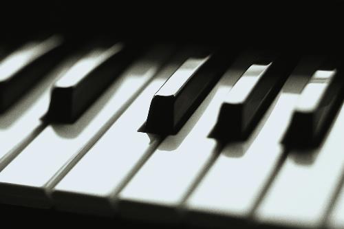 musician - a close-up on piano keys