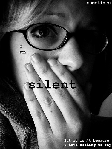 social anxiety - greyscale photo of woman with social anxiety, words say, 'Sometimes I am silent, but it isn't because I have nothing to say.'