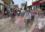 social anxiety - picture of a crowded street/sidewalk, people blurred slightly.