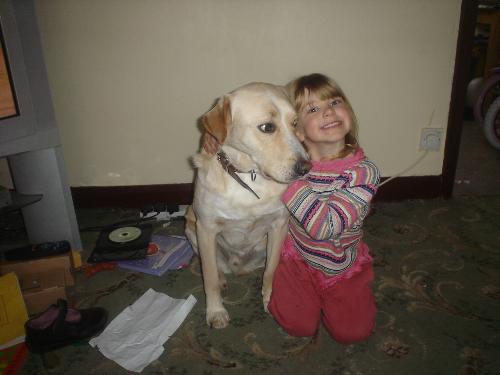 Labradors, great with children - Here is our rescue labrador Nero, looking after our youngest daughter, he is a great pet and just so cute blessed be