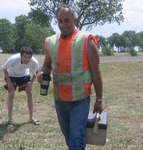 My Dad - My dad at the Cedar Bluff Lake in Kansas with my brother behind him(don't know why he's laughing).