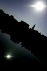 psychology - a yin-yang with a city, water, the sky, and the moon