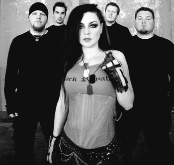 Evanescence - The band Evanescence, standing together as a group with Amy Lee in the forefront.