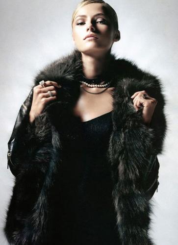 a black fur coat wore by a model, anti fur or like - a black fur coat wore by a model, anti fur or like fur?