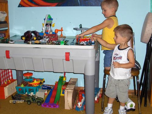 Playing with old toys - My grandsons playing with their daddy&#039;s old toys.