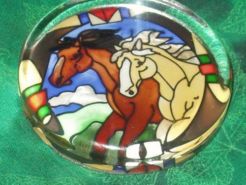 Horses paperweight - This is the most beautiful paperweight! My mother found it at a thrift store for practically nothing and bought it for me. It's really heavy, about 1/2 inch thick glass and has gray felt on the bottom and I love it! Mom haunts the thrift stores and really finds some cool stuff sometimes!