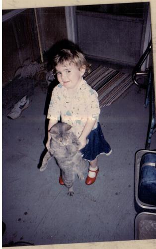 Dances with Cats - My daughter at age 2 playing with her cat, Nitey.