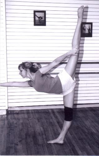 Dancer - This picture is a picture of me doing a leg hold in my dance studio.
