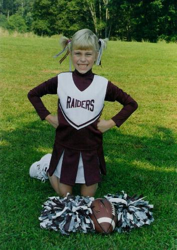 Midget league cheer - My daughter posing for her picture last year