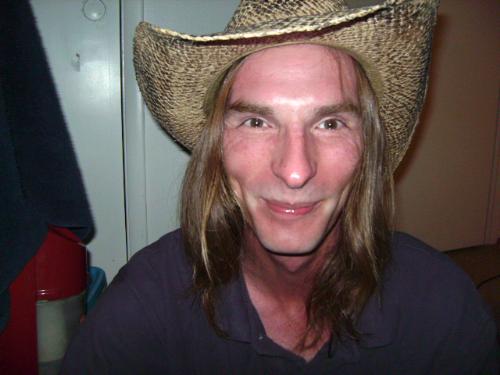 an old cowboy - This is a picture of an old cowboy I took. He's actually young. He is working on getting older though.
