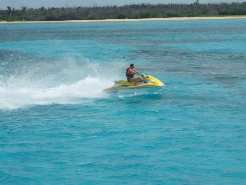 Cozumel - A man riding a jet ski in cozumel Mexico