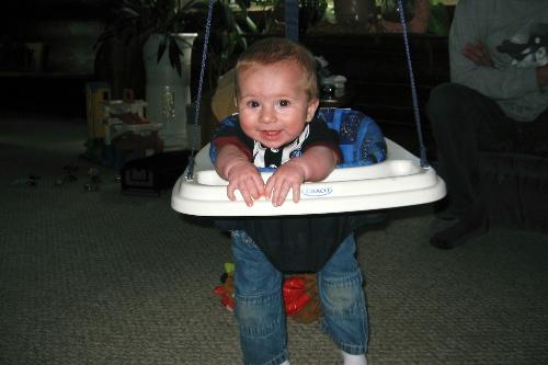 Dylan in Johnny Jump Up  - This is my son Dylan playing in his Johnny Jump Up at his Grand parents house. July 2007