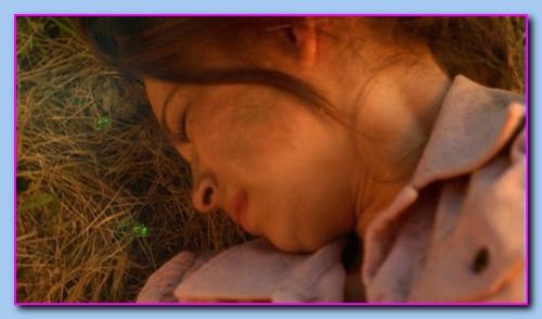 Kristin Kreuk - Kristin Kreuk as Lana Lang in Smallville 'Sbscura' after the explosion and unconscious among meteor rock fragments.