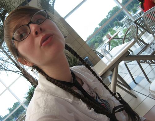 Song at the Mall - It looks like I'm singing~! But, I'm actually just in the middle of talking... It's kind of a cute face though.
