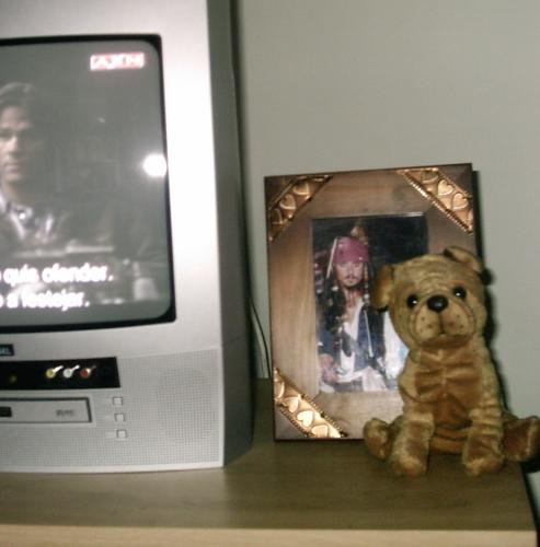 Johnny Depp Framed - This is how crazy i am about Johnny Depp, i have a framed piture of him on my TV set table!!