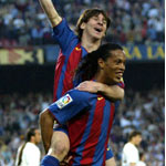 Messi and Ronaldinho - A picture of Lionel Messi and Ronaldinho some of the greatest footballers in the world.