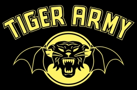 Tiger Army Logo - Tiger Army is a Psychobilly band that was formed in 1995 in Berkeley, California.  The band played their first show at legendary venue 924 Gilman Street in Berkeley, California, with AFI on March 29, 1996. After making a name for themselves playing shows throughout the California area alongside AFI and English psychobilly pioneers The Meteors, they were signed to Chapter Eleven Records.  Tiger Army first entered the studio in the summer of 1996 to record a self-titled vinyl record EP, now referred to as the Temptation EP. This EP caught the attention of Tim Armstrong (of Operation Ivy and Rancid fame), owner of Hellcat Records, who signed the band. Tiger Army recorded their first full-length, the self-titled Tiger Army, in January of 1999. It was released that October. Stand-up bassist Joel Day left Tiger Army before the band was signed, so the Quakes stand-up bassist Rob Peltier was hired to play on the album.  During the ensuing California mini-tour promoting the album, Nick 13 (vocals and guitar of Tiger Army) asked Geoff Kresge, one of his former bandmates from his first band, Influence 13, to join the band. Kresge accepted, and joined as a permanent member a few months later. The band was asked to play on the Danzig and Samhain tour in 2000, where they befriended Samhain drummer London May. He joined the band when Adam Carson left.  The band recorded a second album, Tiger Army II: Power of Moonlite in 2001. London May left shortly after the recording, and was replaced with Fred Hell.  On March 10, 2003, Fred Hell was shot four times, including once in the head, by armed robbers who broke into his friend's apartment in Chino, California. A bullet became lodged in his brain, making it necessary for him to go through physical therapy before he could play drums again. At the time, the band was in the process of recording the album Tiger Army III: Ghost Tigers Rise. At first, the record was repeatedly delayed to make time for him to recover enough to perform, but his injuries proved serious enough for the band to hire a studio drummer, Mike Fasano, drum tech for both Rancid and Tiger Army, to play on the album. Hell attempted to play on the tour supporting the album's release, but he was again forced to stay and recover while Fasano joined the band on the road. In July 2004, Hell decided to depart from the band in light of his injuries.  Only months later, in September 2004, Geoff Kresge departed the band to focus his efforts on his new record label, Dead Body Records and began recruiting members for a new band called Viva Hate. He would join his wife Kamilla with Horrorpops as a guitarist a month later. Nick 13 quickly announced a new line-up for Tiger Army, featuring drummer 'Wasted' James Meza (formerly of numerous other small Los Angeles psychobilly bands, and a former touring drummer for the Nekromantix) and stand-up bassist Jeff Roffredo (formerly of Cosmic Voodoo and Calavera), who are now full-time members of Tiger Army.  Tiger Army's fourth album, titled Music From Regions Beyond, was released on June 5, 2007[1] and was produced by Jerry Finn.[2]  Tiger Army are currently featured on the main stage for the entire 2007 Vans Warped Tour.[3]  Tiger Army has roots in northern california but claims soutern.