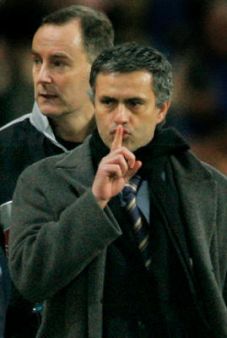 Jose Mourinho - Jose Mourinho giving the quite signal to opposing fans.