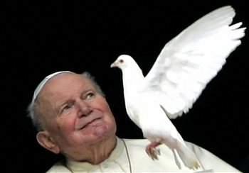 giovanni paolo II - photo of giovanni paolo II with a white dovebehind him.