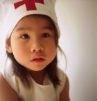 nursing wannabe - small child in nursing uniform